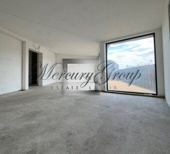 A penthouse with a terrace is for sale in the city center.