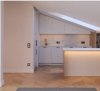 A three-room apartment with a terrace for sale in the quiet city center