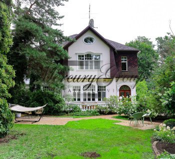 Elegant villa with tennis court and pool in Lielupe