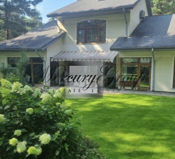 A large family house with a pool in a closed and guarded area in the village of Sunīši. 