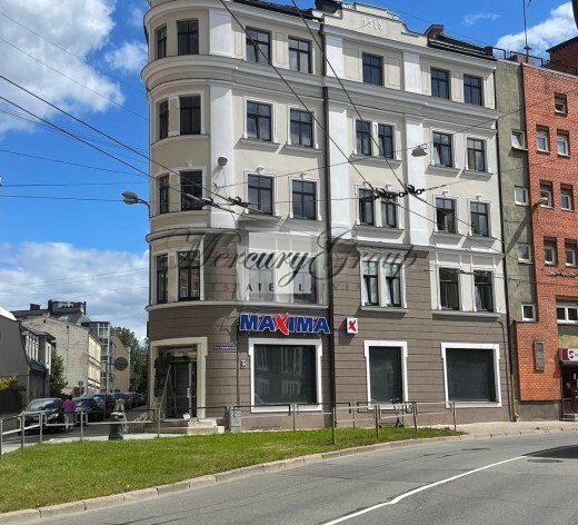 Residential building with commercial premises ...